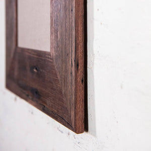 Side on shot of Wide reclaimed timber photo frame for A4 size image. Vertical picture frame. 