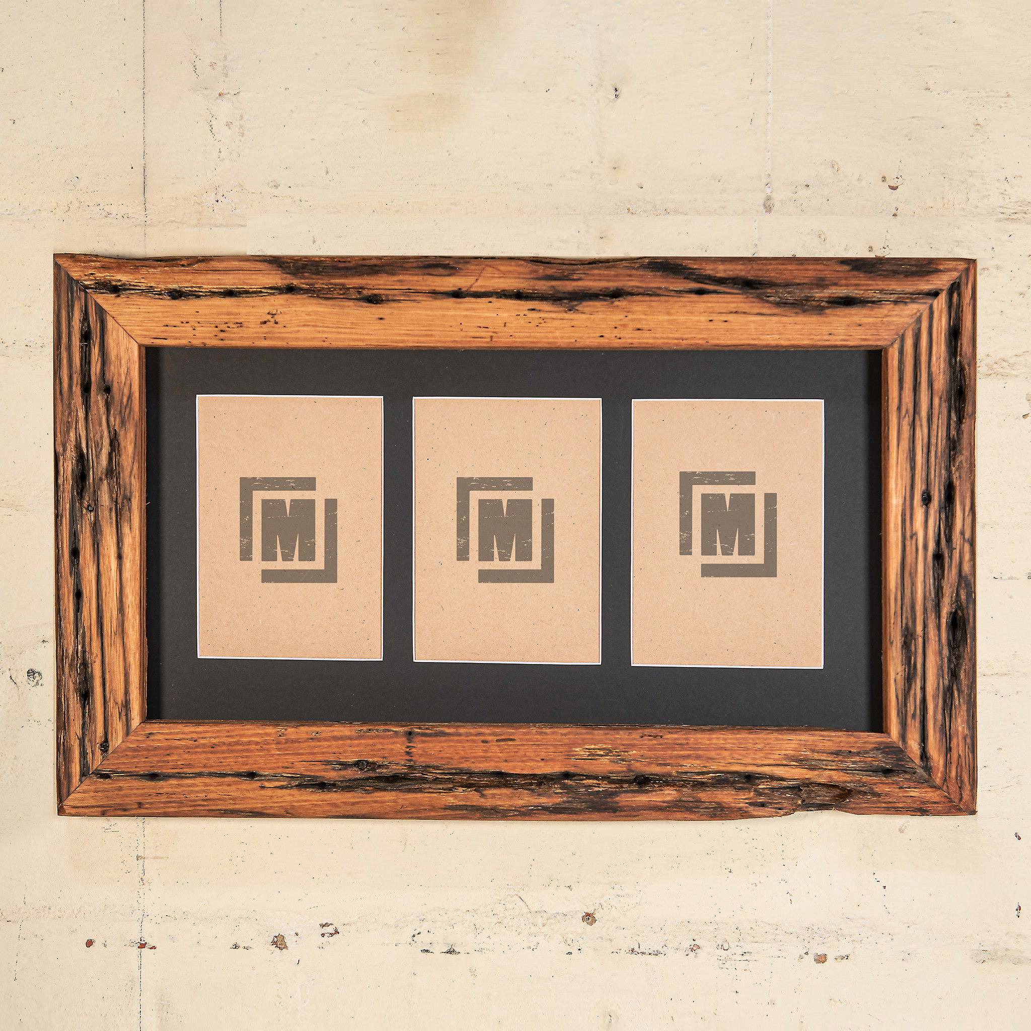 Weathered timber photo frame with lots of timber grain, showing 3 photos with a black border. 