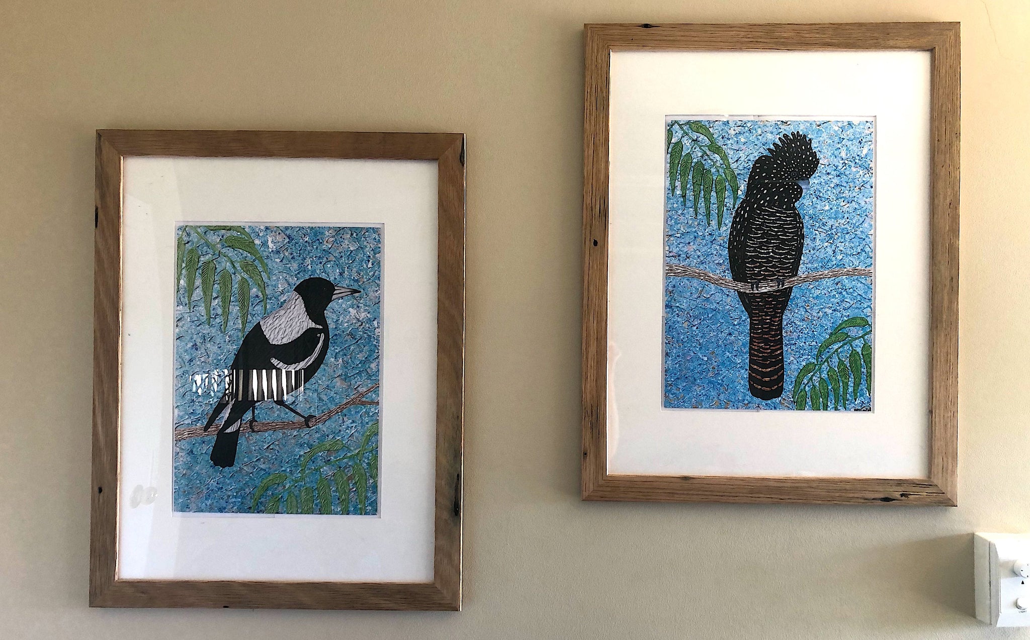 Is glass or acrylic glass best for my frames?