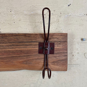 Recycled Wooden coat rack and hat rack with brown hooks. Australia
