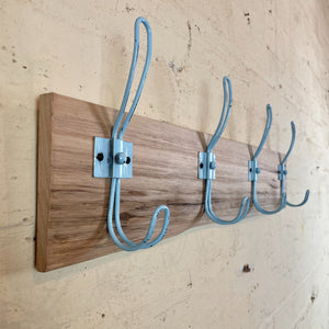 Recycled wooden coat rack with blue hooks Australia.