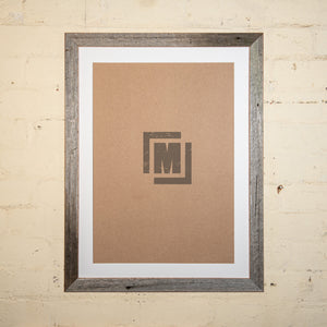 framing shop with a varity of rustic photo frames. 