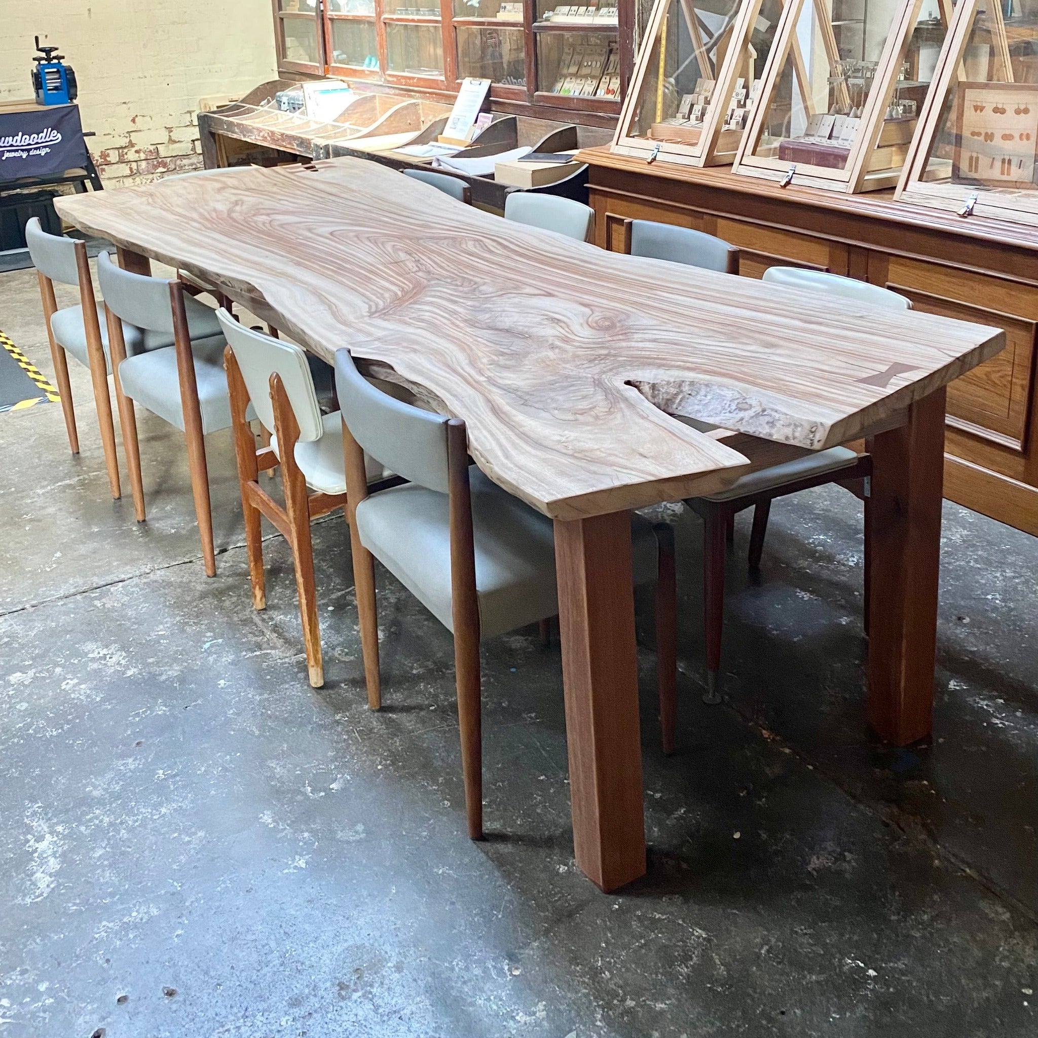 Upcycled 10 seater dining table in Melbourne Australia. Made from recycled hardwood. 