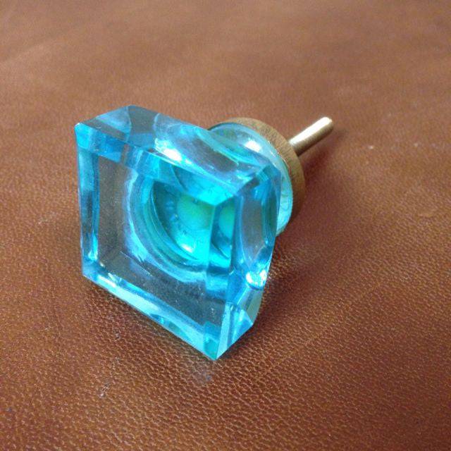 Light blue cupabord handles. 