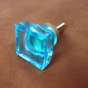 Light blue cupabord handles. 