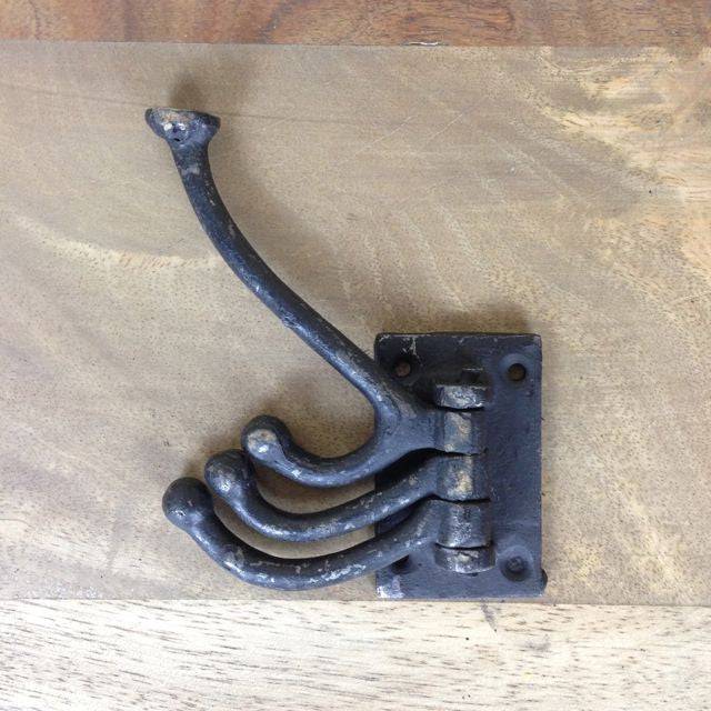 Versatile, black 3-arm, wall hook to hang multiple