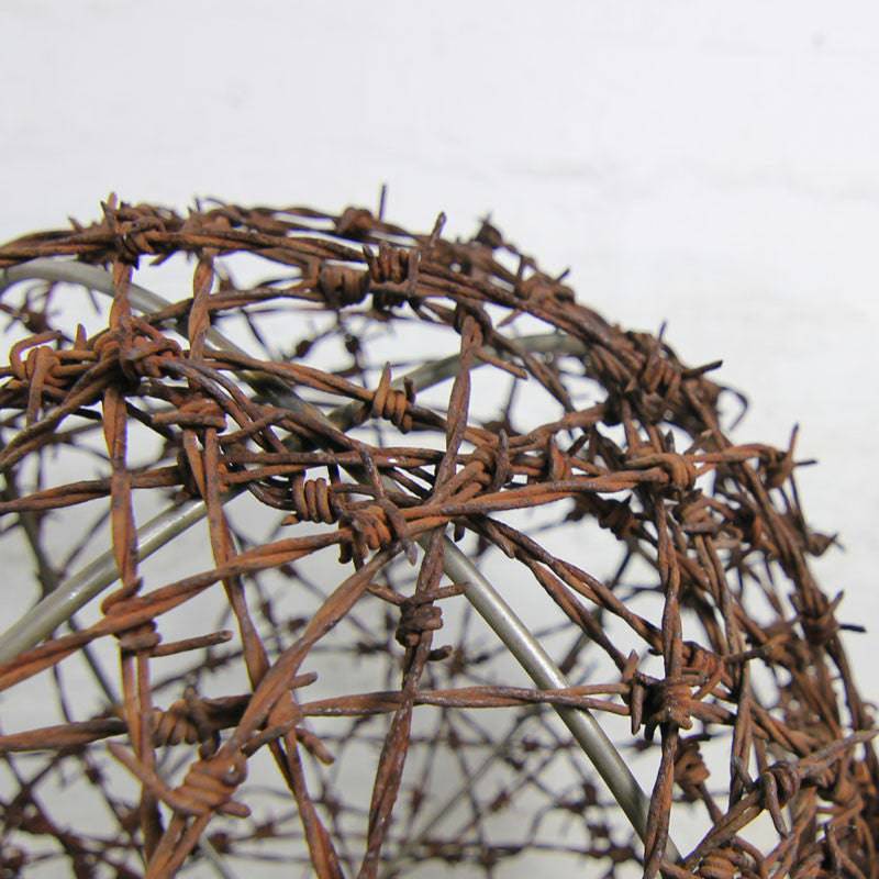Rustic barbed wire ball light fittings Australia. 