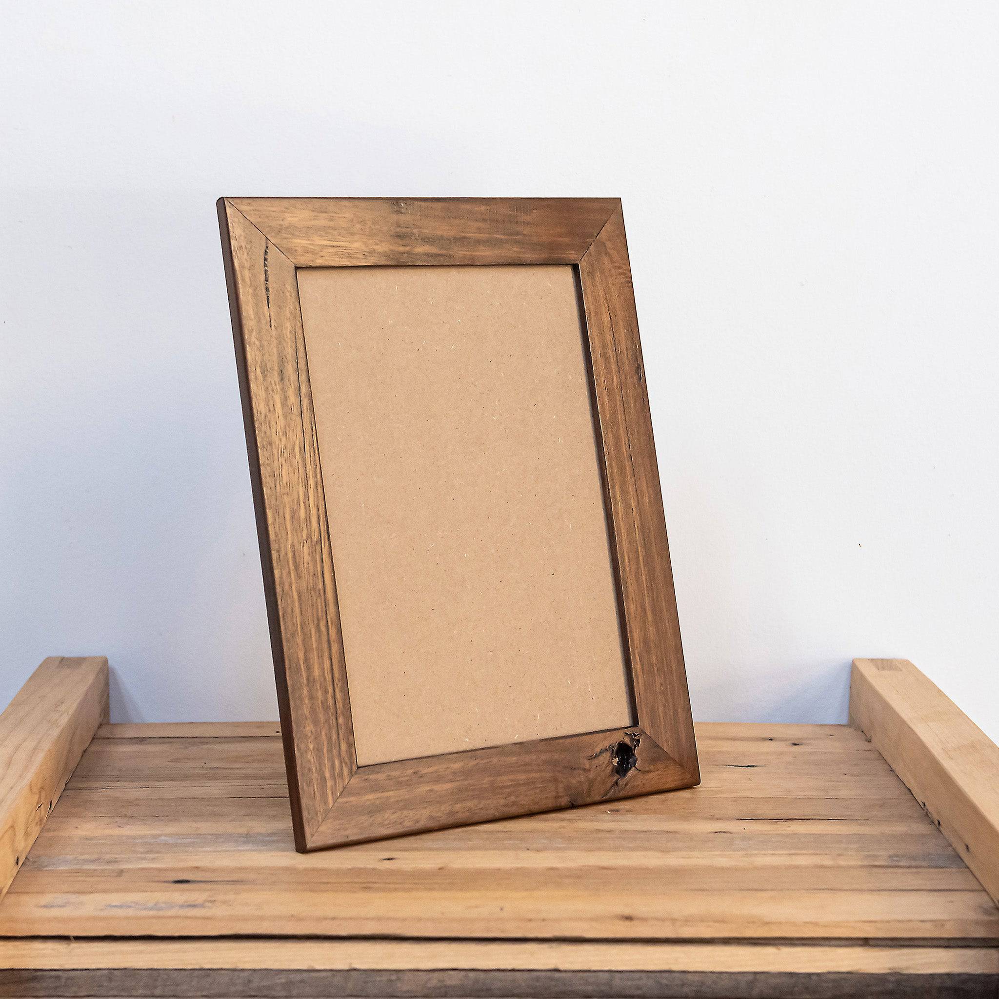 Online picture frame that can stand on a desk for A4 image. Dark wood realimed timber. 