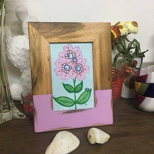 custom photo frame australia. Photo frame standing on mantlepiece. 