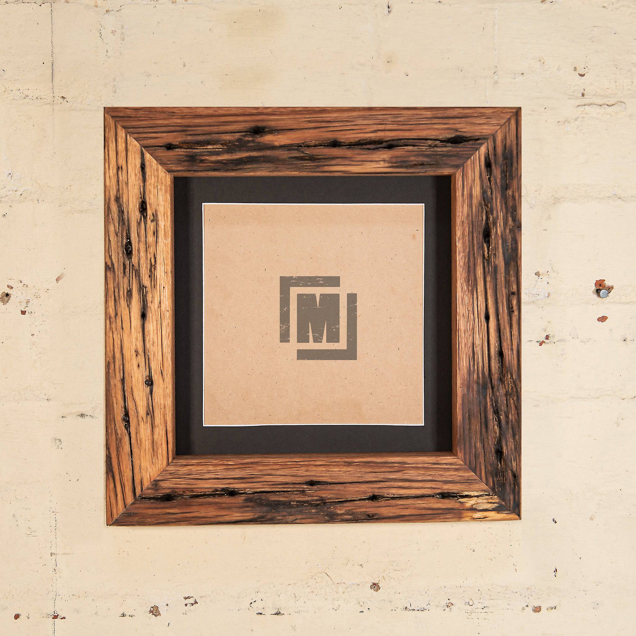 timber picture frames with an off white border in thick timer