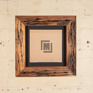 timber picture frames with an off white border in thick timer