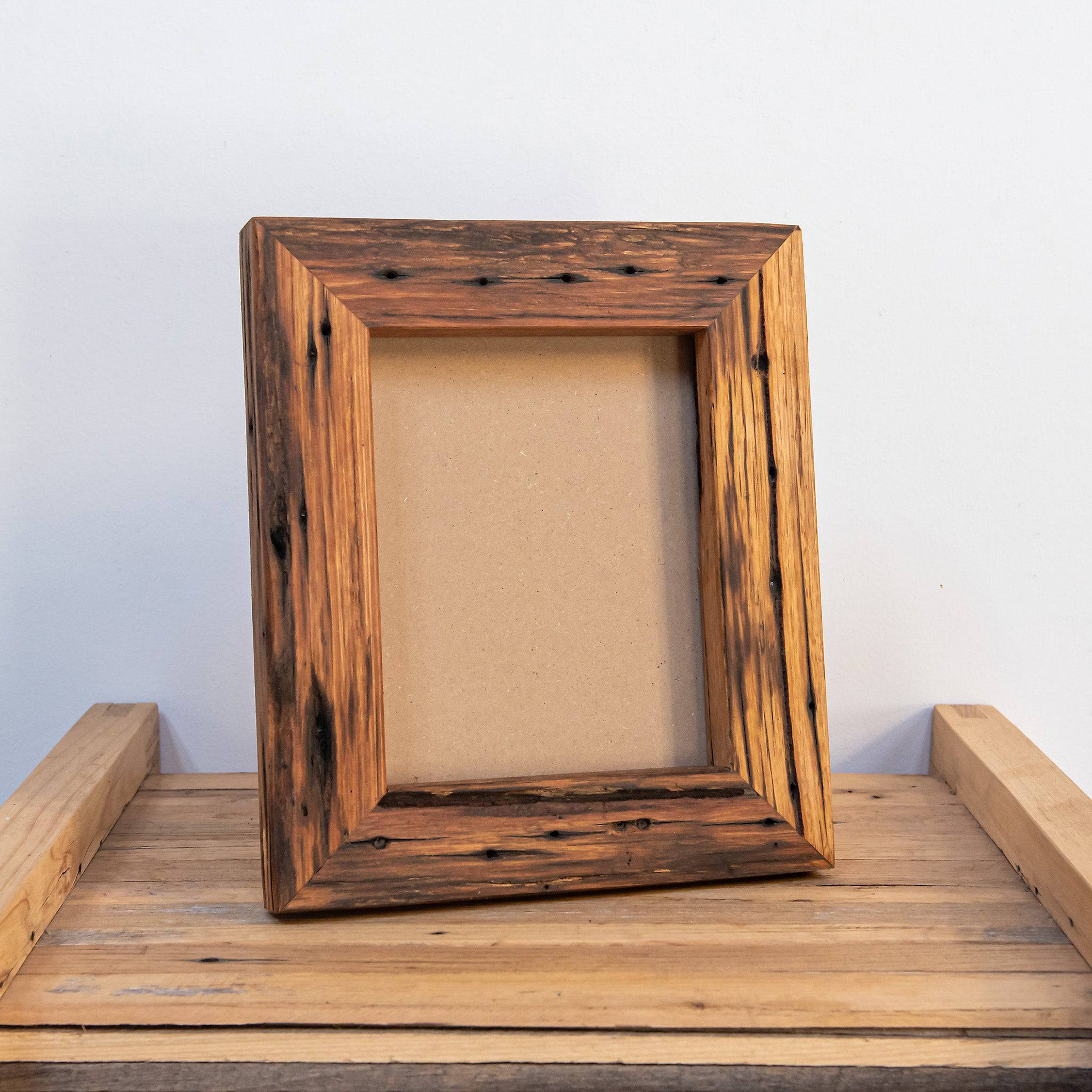sustainable photo frames in natural timber with off white mat board. 